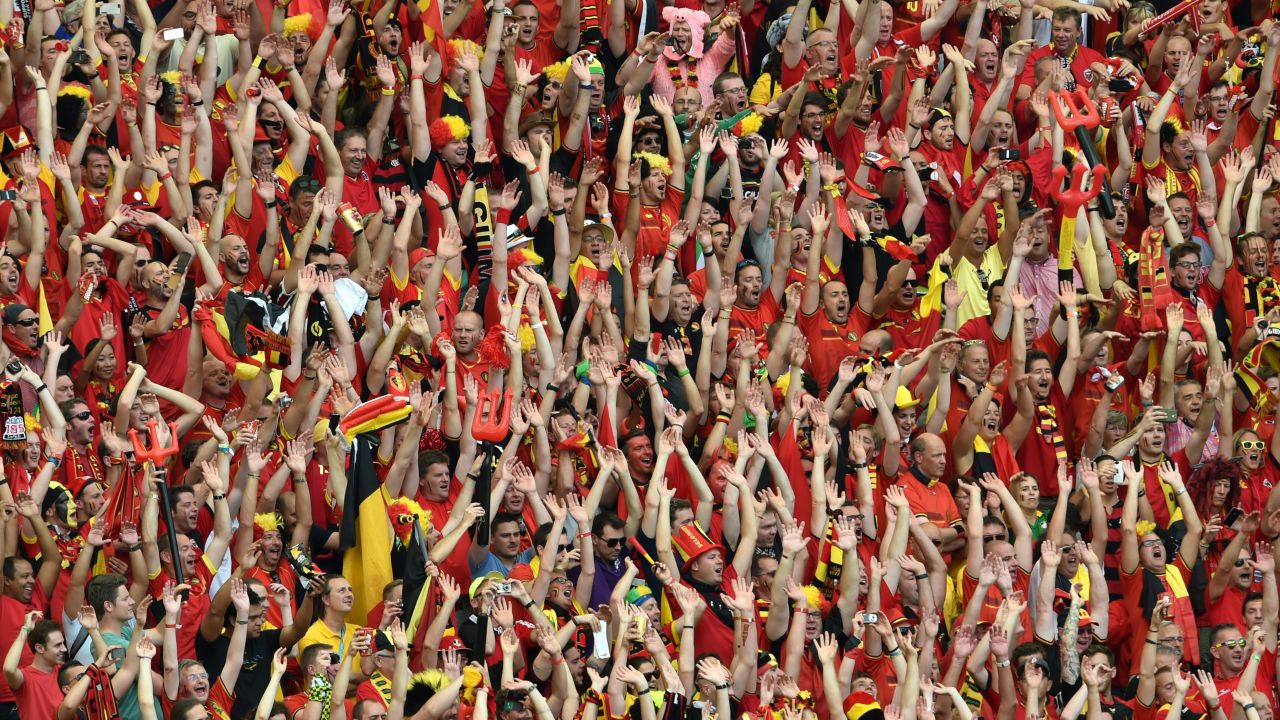 Belgian supporters cheer for their team.