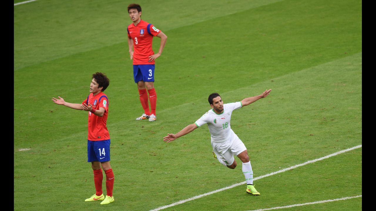 Algerian forward Abdelmoumene Djabou celebrates scoring his team's third goal against South Korea.