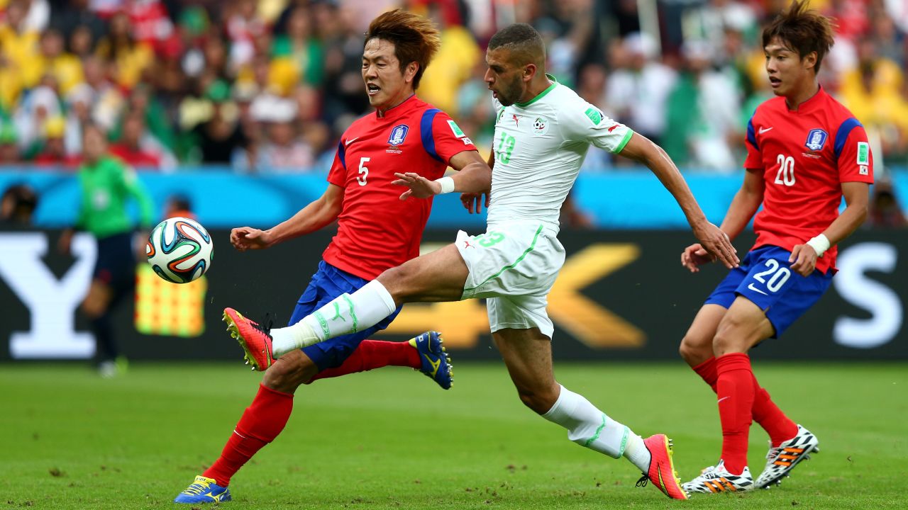 Islam Slimani of Algeria scores the first goal against South Korea.