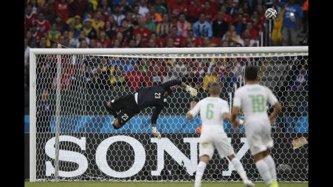 Algeria's goalkeeper Rais M'bohli makes a save.