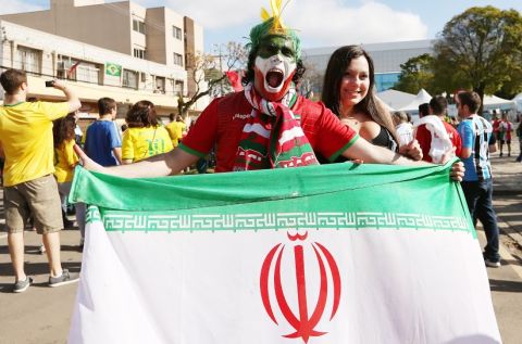 Two fans get ready to enjoy the excitement at the 2014 World Cup in Brazil.