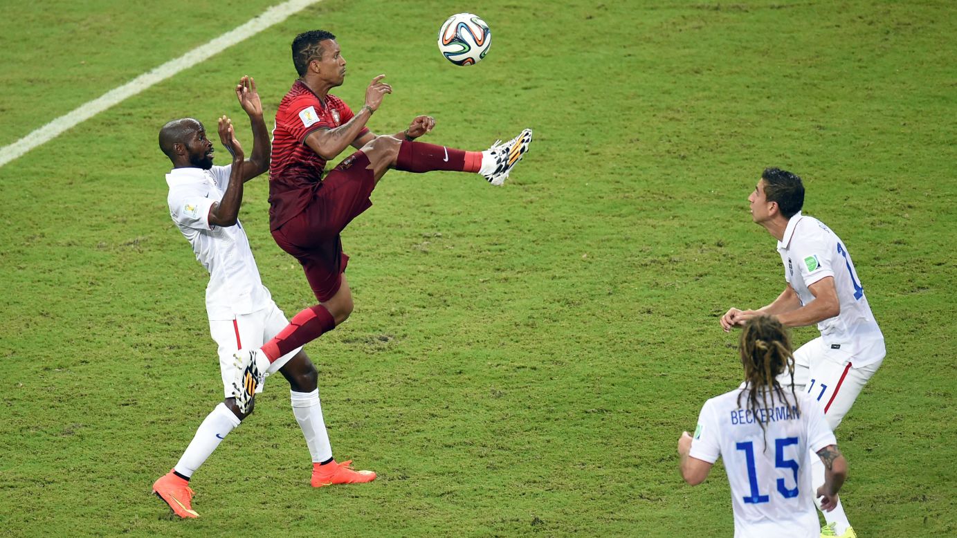 Portugal forward Nani jumps for the ball.