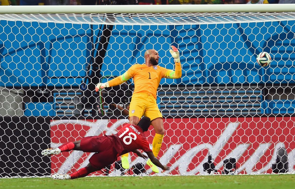 Talk about down to the wire. Silvestre Varela of Portugal scores his team's second goal past United States goalkeeper Tim Howard during a World Cup game at Arena Amazonia in Manaus, Brazil, on Sunday, June 22. The goal, scored with less than one minute left to play, led to a 2-2 draw.