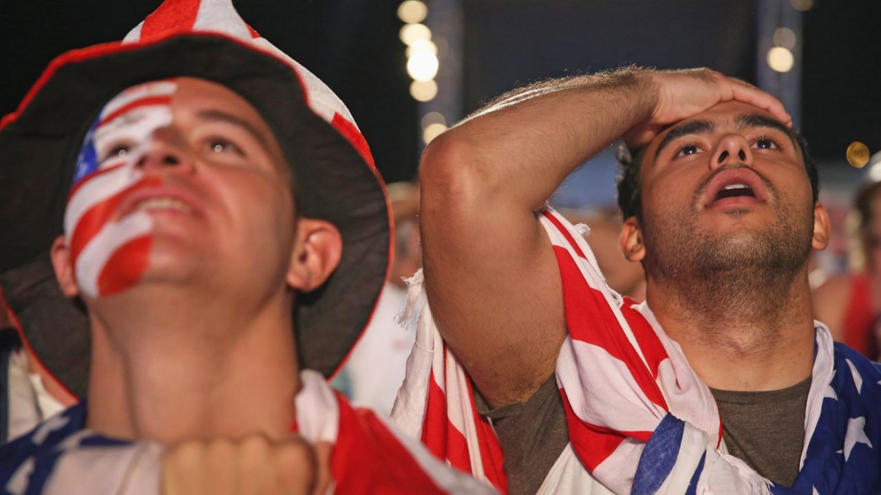 USA soccer fans watch their team play against Portugal on a screen setup at the FIFA Fan Fest on Copacabana beach June 22, 2014 in Rio de Janeiro, Brazil. The match ended in a tie 2-2. (Photo by Joe Raedle/Getty Images)