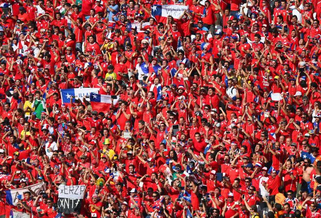 Chile fans cheer prior to the match between the Netherlands and Chile at Arena de Sao Paulo.