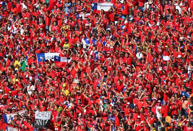 Chile fans cheer prior to the match between the Netherlands and Chile at Arena de Sao Paulo.