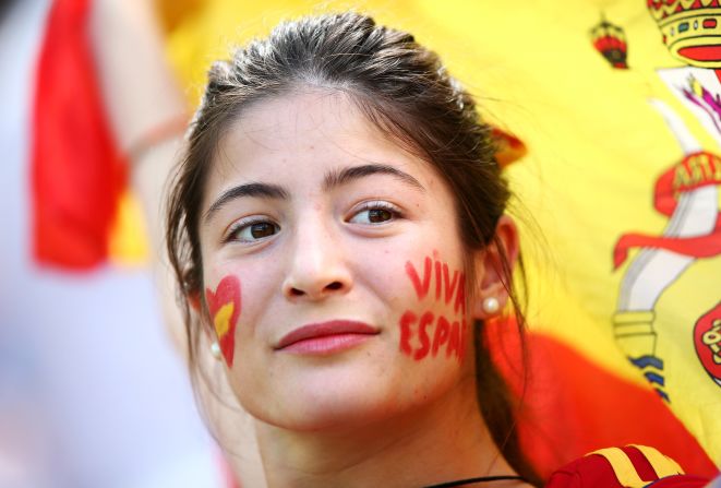 A Spain fan looks on prior to the match against Australia. <a href="index.php?page=&url=http%3A%2F%2Fwww.cnn.com%2F2014%2F06%2F22%2Ffootball%2Fgallery%2Fworld-cup-0622%2Findex.html">See the best World Cup photos from June 22.</a>