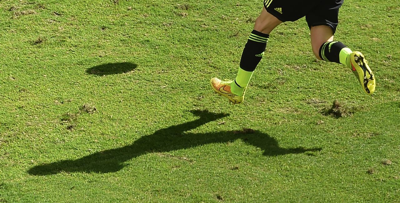 Spain midfielder Andres Iniesta runs the field.