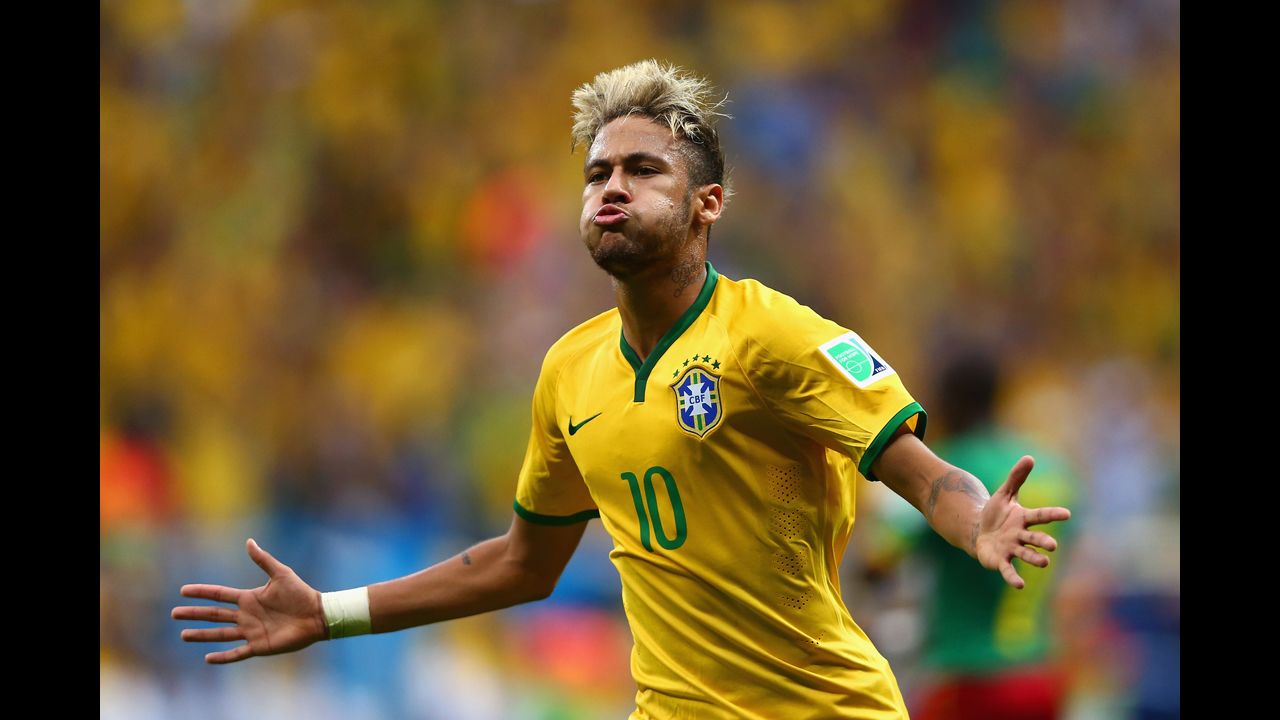 Neymar of Brazil celebrates scoring his second goal of the game.