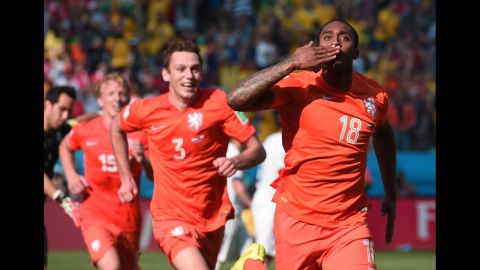 Netherlands midfielder Leroy Fer celebrates scoring the team's first goal against Chile.