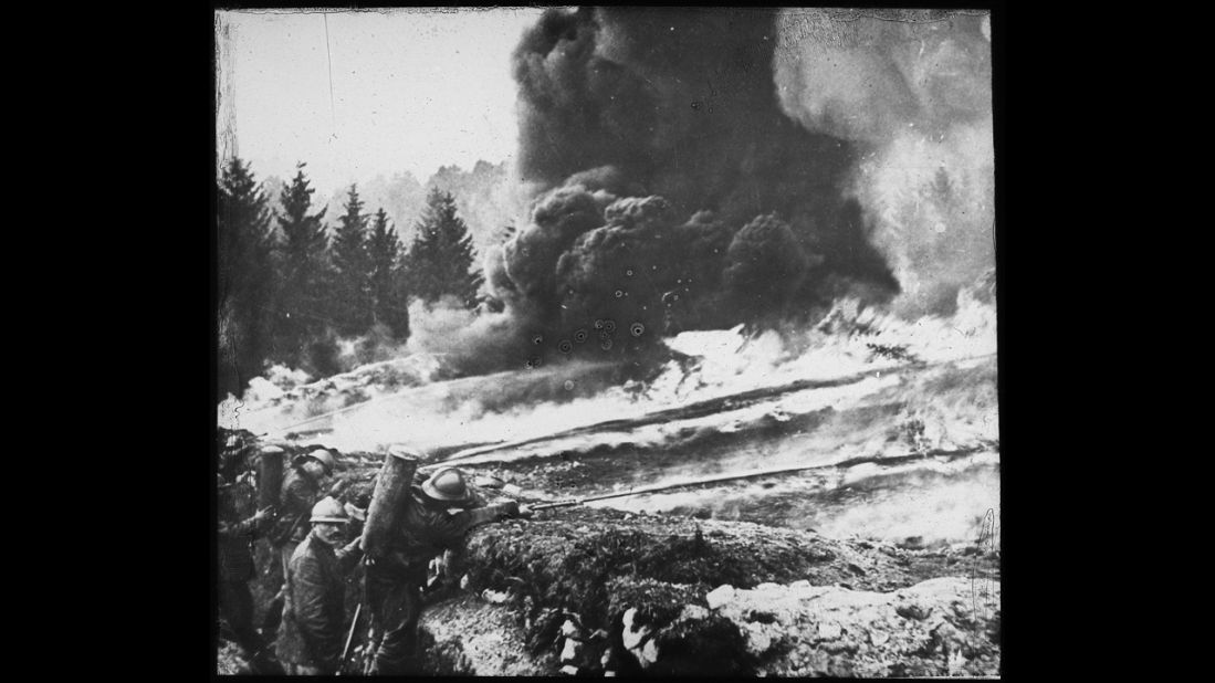 French soldiers making a gas and flame attack on German trenches in Flanders, Belgium, in 1918. German forces were the first to open valves on gas cylinders, releasing the toxic cloud on unprepared French troops in Ypres in 1915.