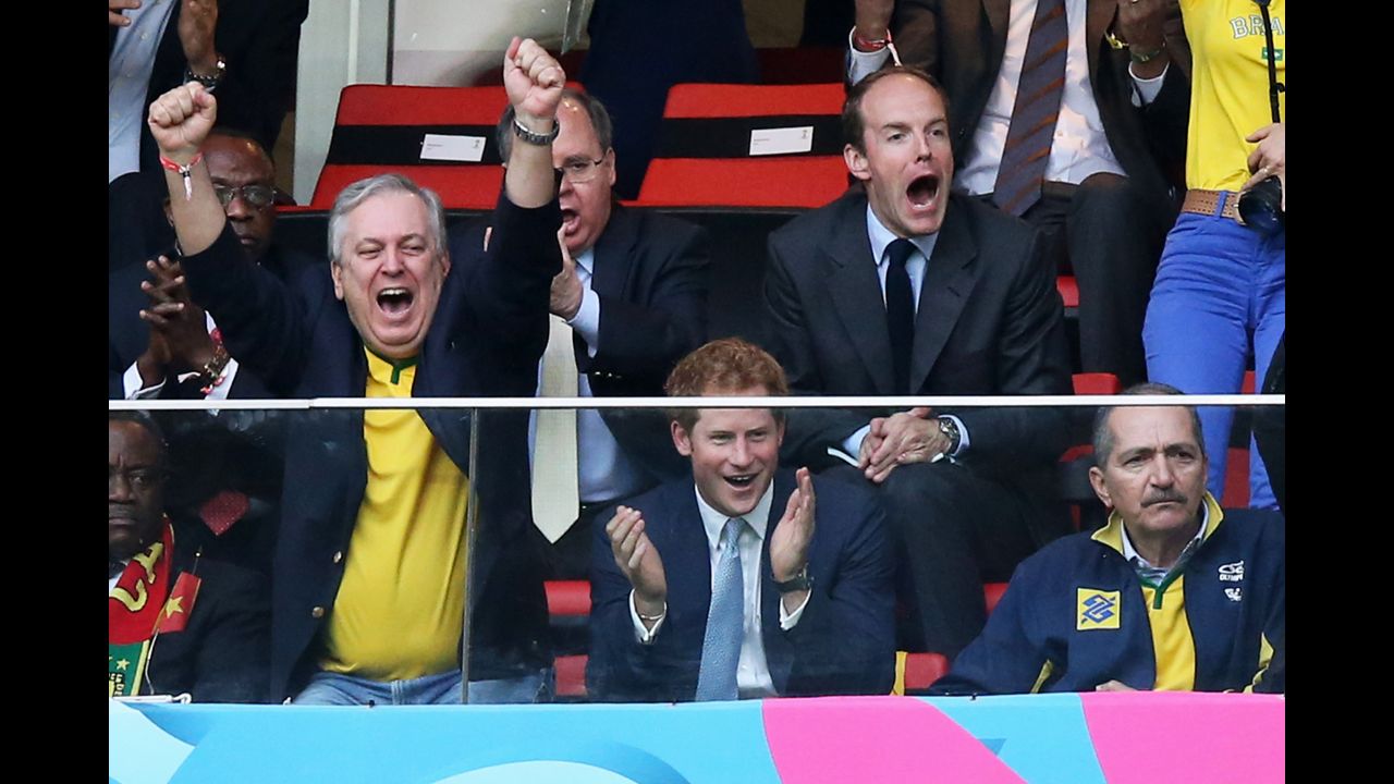 Prince Harry is seen in the stands celebrating Brazil's first goal shot by Neymar.