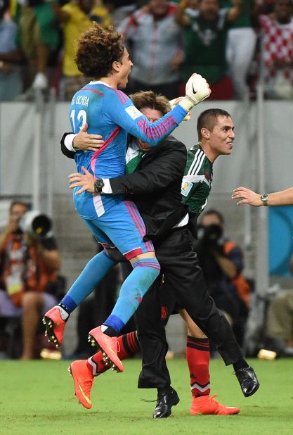 Herrera celebrates one of Mexico's goals against Croatia with goalkeeper Guillermo Ochoa. He later told a press conference Monday was "one of the happiest days of his life."