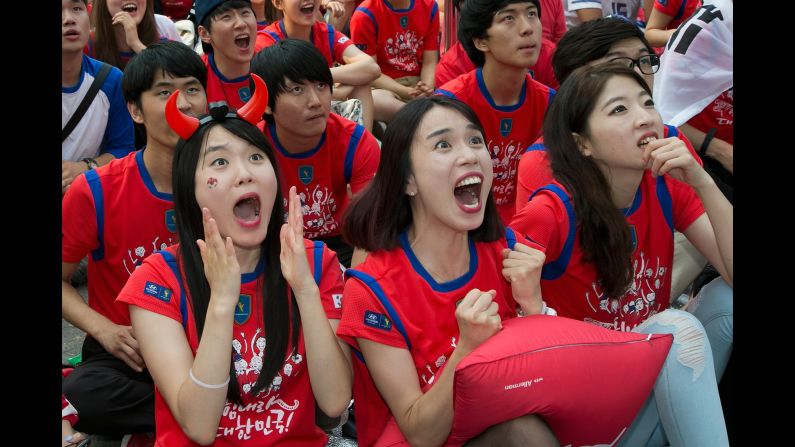 South Korea fans in Seoul react during the 1-1 draw against Russia on Wednesday, June 18.