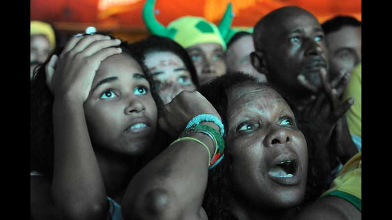 Brazil supporters watch the Brazil-Mexico game in Rio de Janeiro on Tuesday, June 17. It was a 0-0 draw.