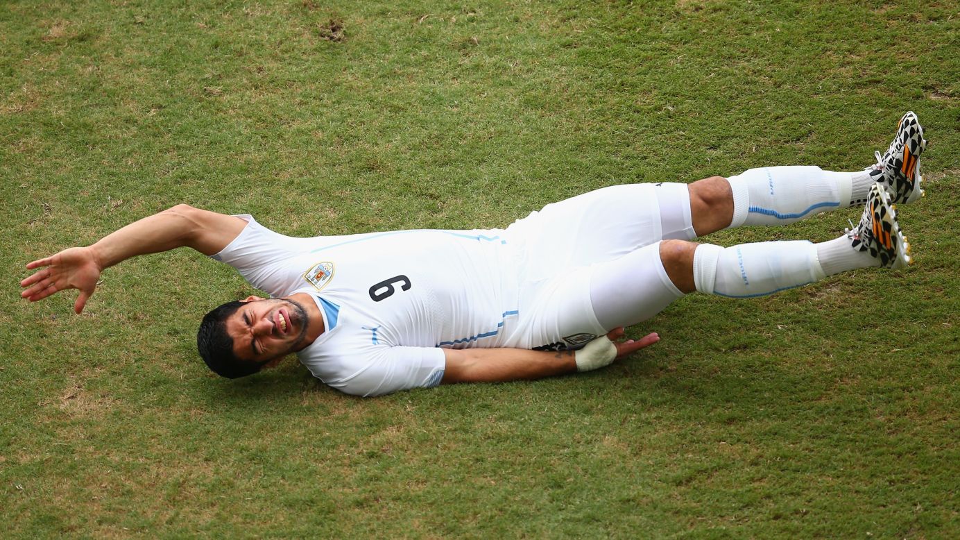 Luis Suarez of Uruguay reacts during a fall. 