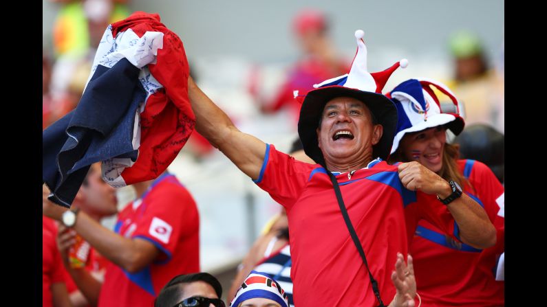 A Costa Rica fan enjoys the atmosphere prior to the match against England. <a href="index.php?page=&url=http%3A%2F%2Fwww.cnn.com%2F2014%2F06%2F23%2Ffootball%2Fgallery%2Fworld-cup-0623%2Findex.html">See the best World Cup photos from June 23.</a>