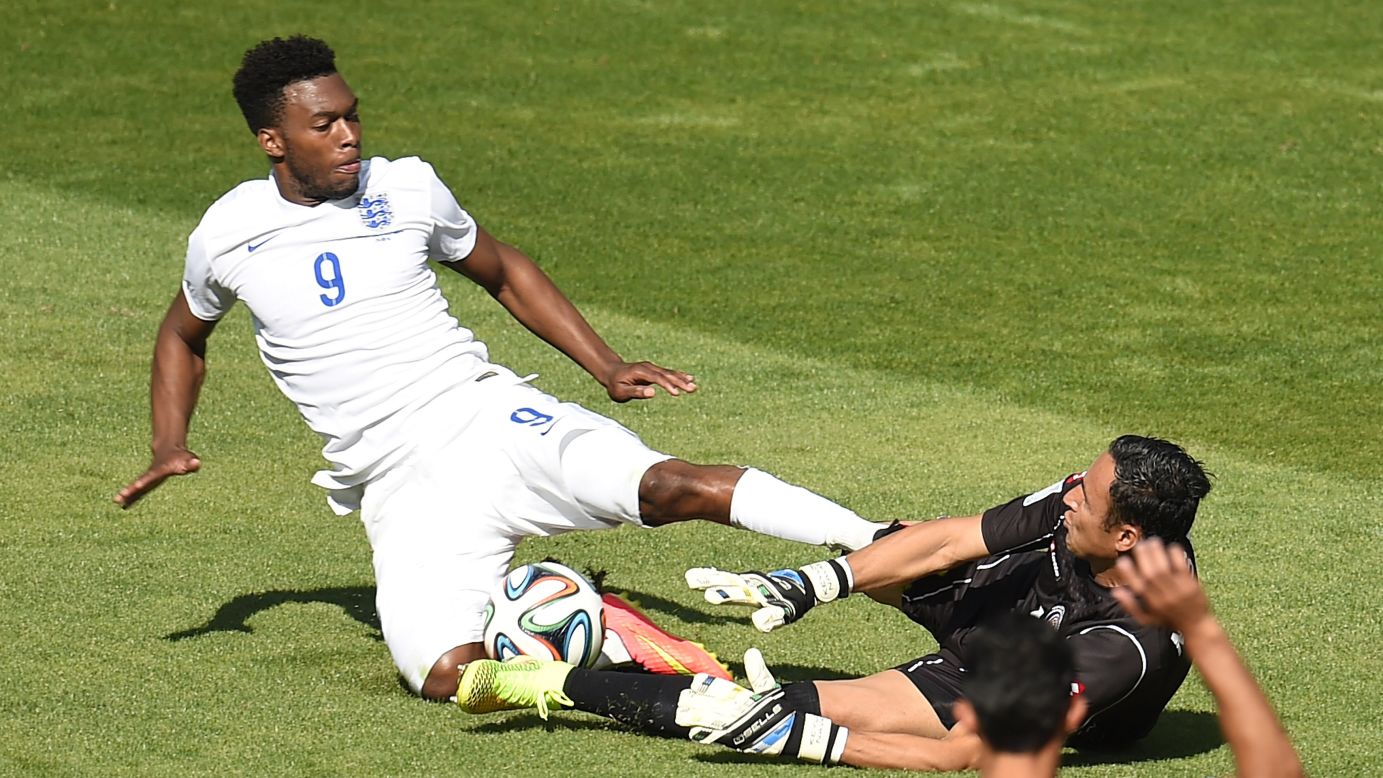 England forward Daniel Sturridge, left, challenges Costa Rica goalkeeper Keylor Navas. 