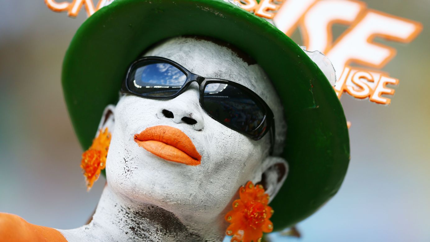 An Ivory Coast fan enjoys the atmosphere prior to kickoff.