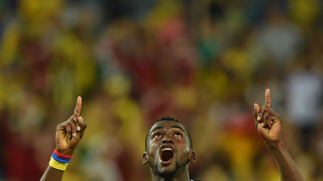 Colombia's Jackson Martinez celebrates after scoring his second goal against Japan.