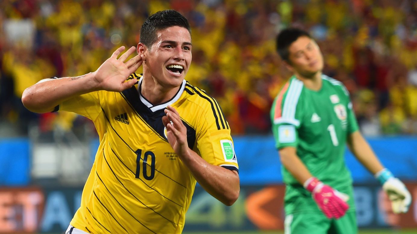 Colombia's James Rodriguez celebrates after scoring his team's fourth goal past goalkeeper Eiji Kawashima of Japan.