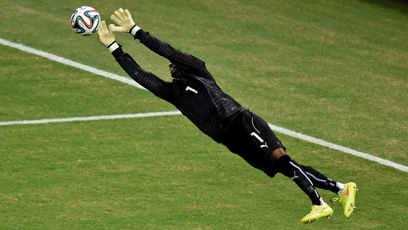 Ivory Coast's goalkeeper Boubacar Barry makes a save against Greece.