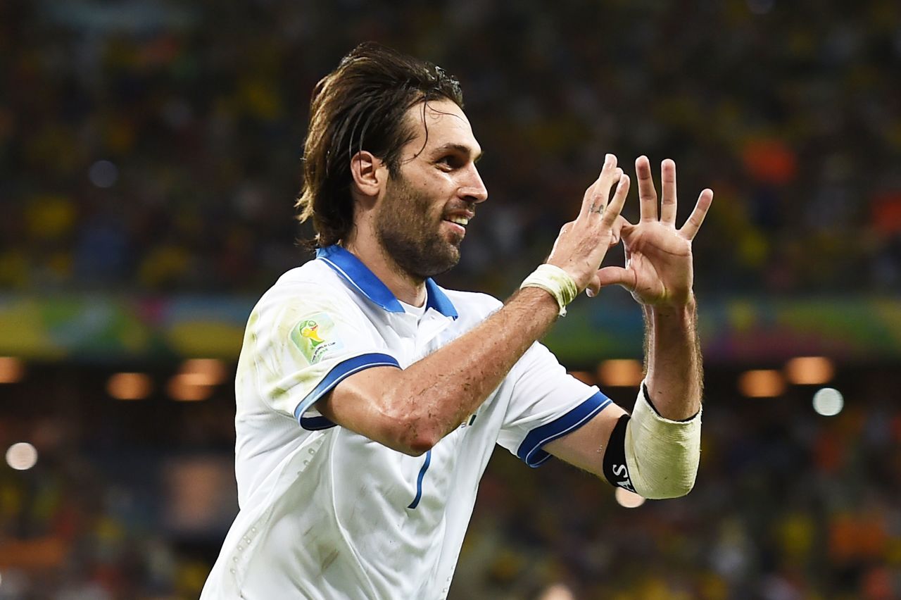 Giorgos Samaras of Greece celebrates scoring his team's second goal on a penalty kick against the Ivory Coast on Tuesday, June 24, in Fortaleza, Brazil. Greece won 2-1.