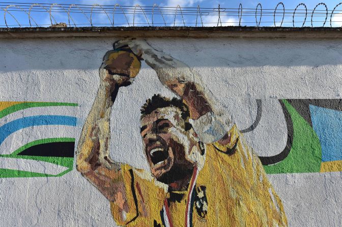 This image immortalizes the generation of USA '94, depicting Brazil football legend and former captain, Dunga lifting the FIFA World Cup trophy in the Pasadena Rose Bowl.
