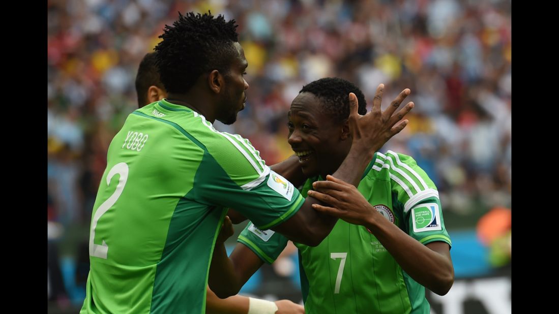 Musa, right, celebrates his goal with Nigeria defender Joseph Yobo during a match against Argentina.
