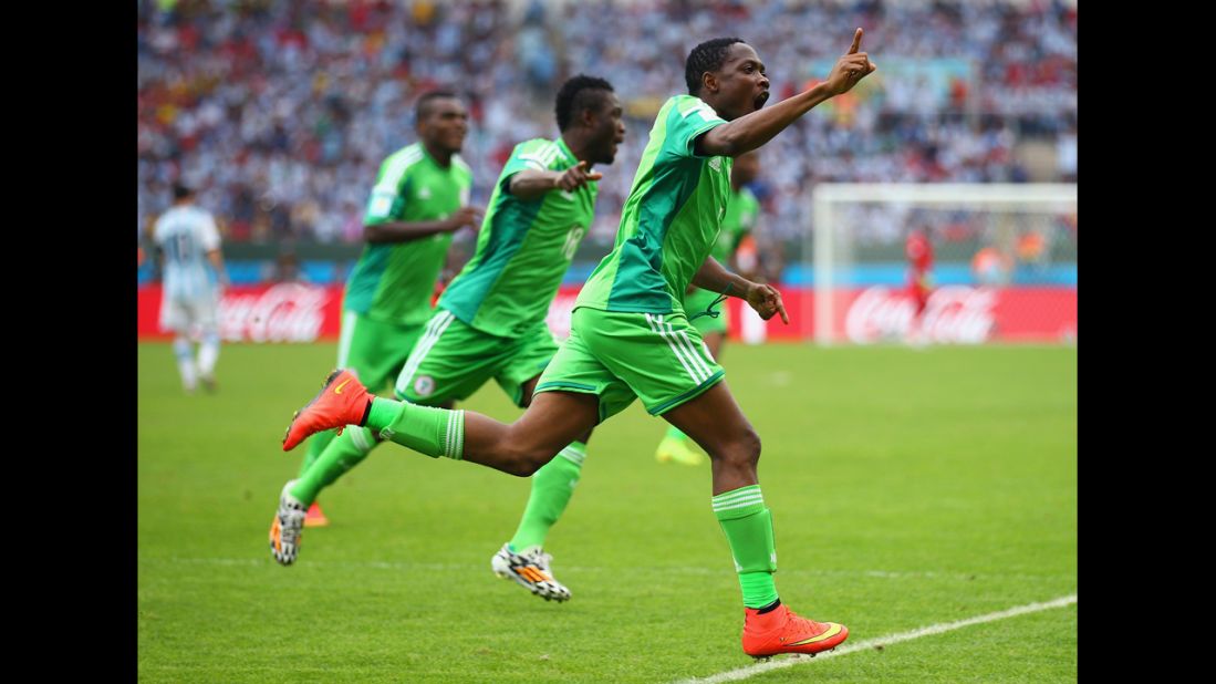 Nigeria forward Ahmed Musa celebrates scoring his team's second goal against Argentina. 