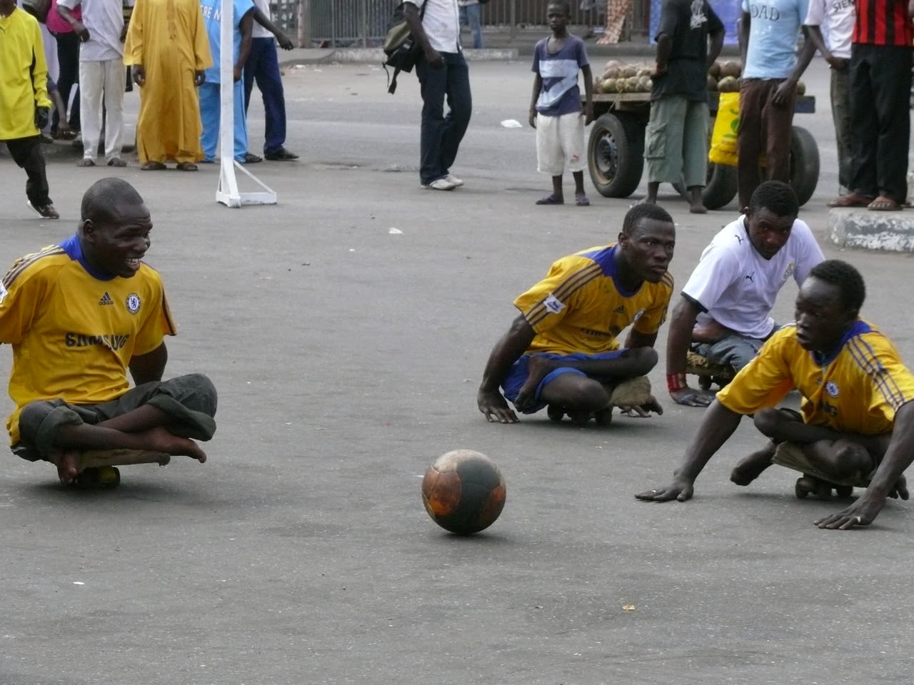 During the week, many of the players beg in the streets for money. 