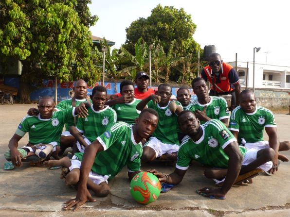 Frimpong (back) hopes to one day find a sponsor. He introduced the game in Accra to help better the lives of the city's impoverished polio sufferers.