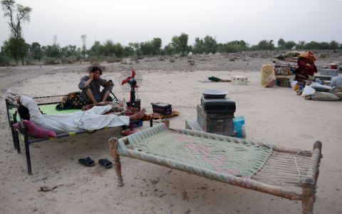 Displaced Pakistani civilians rest on their arrival in Bannu on June 24. The Pakistani Army launched an offensive on militants near their homes in North Waziristan, forcing many to seek safety.