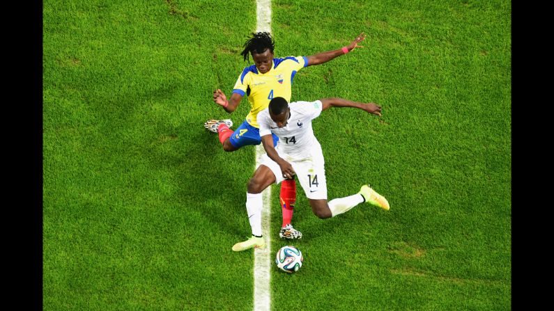 Blaise Matuidi of France controls the ball against Juan Carlos Paredes of Ecuador.