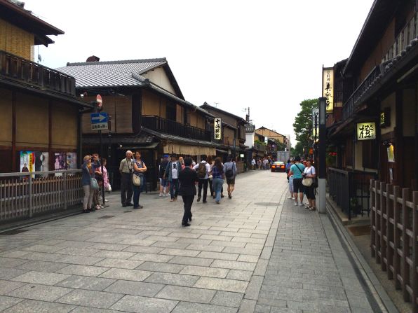 Every day at 5:45 p.m., tourists congregate around Hanami-koji street in Kyoto's Gion district in the hopes of being able to spot an authentic geisha headed to a tea house or banquet. 