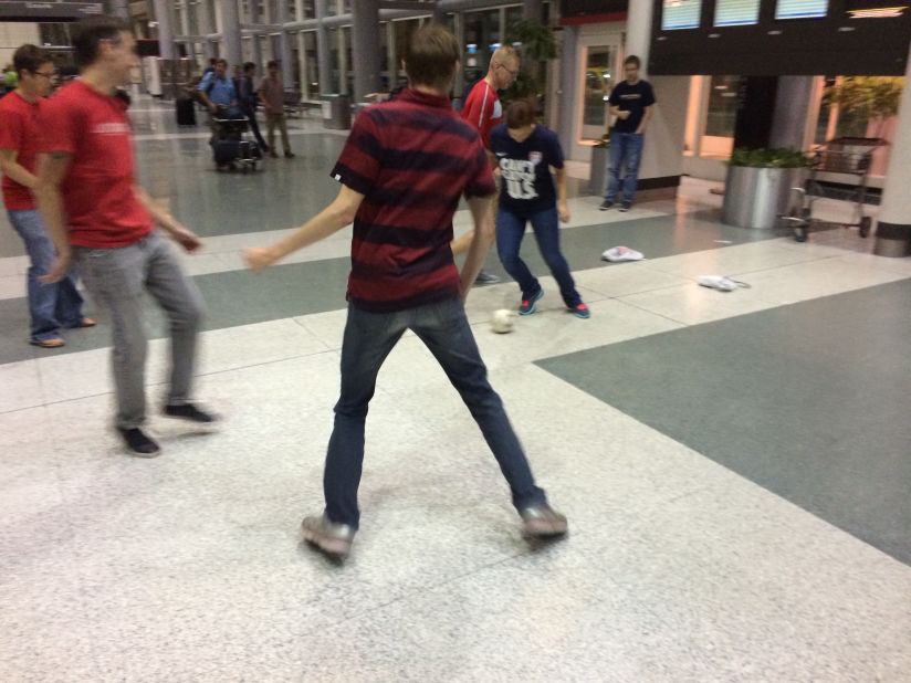 Airports are big places. There's definitely enough room for a game. Earlier this month, Daniel Wiersema, who belongs to American soccer fan club the American Outlaws, captured a shot of fellow members engaged in an impromptu football match at George HW Bush Airport in Texas. The group were en route to Brazil for the 2014 FIFA World Cup. 