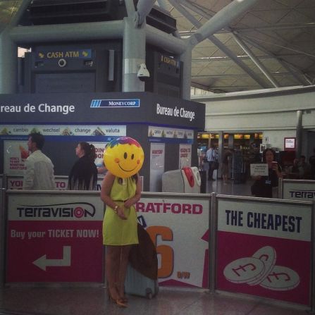 Sometimes, the most entertaining part of traveling is observing your fellow man. While at London's Stansted Airport, passenger Nick Holyoake took a shot of a woman he observed posing with a smiley face balloon. 