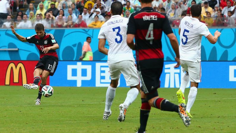 Thomas Mueller of Germany shoots and scores a goal against the United States in Recife, Brazil, on June 26. Germany won the match 1-0.