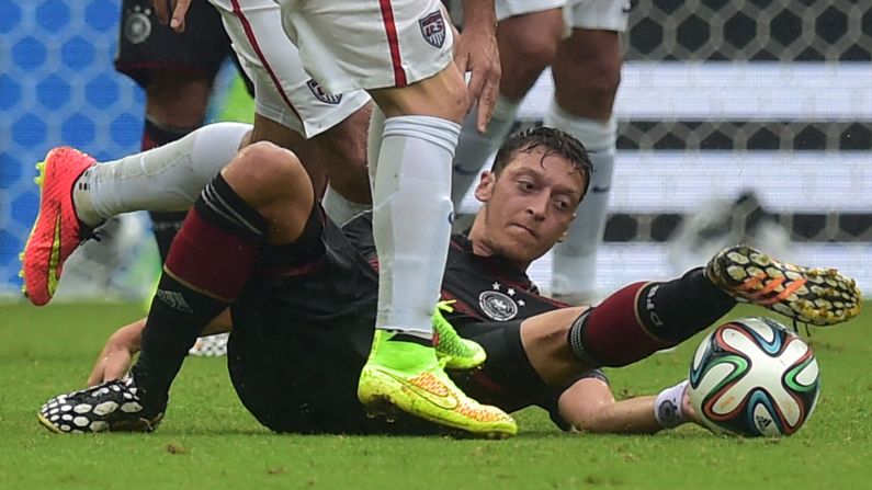 Germany midfielder Mesut Ozil vies for the ball during the match between U.S. and Germany.