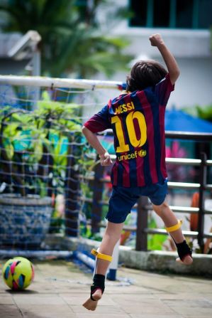 Score! Cristian Catanescu's 9-year-old son celebrates after <a href="index.php?page=&url=http%3A%2F%2Fireport.cnn.com%2Fdocs%2FDOC-1143310">getting a goal</a> on his family's terrace in Singapore. "Football brings joy to this boy! He changed places and continents several times and his best way to connect to local people is through football," said Catanescu.