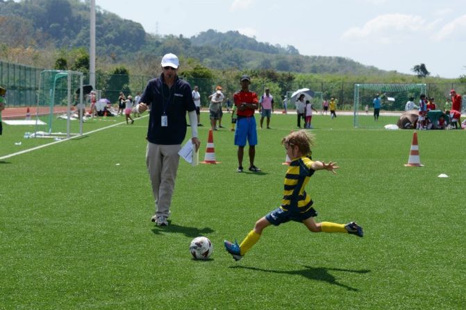 William Hyndman<a href="index.php?page=&url=http%3A%2F%2Fireport.cnn.com%2Fdocs%2FDOC-1142690"> flies through the air</a> as he approaches the ball at a tournament in Phuket, Thailand. "William currently plays on a soccer team with teammates from Singapore, England, Japan, Australia, Romania, Canada and India," said his mom, Tracy. "Our mutual passion for soccer has brought this unlikely group together." 