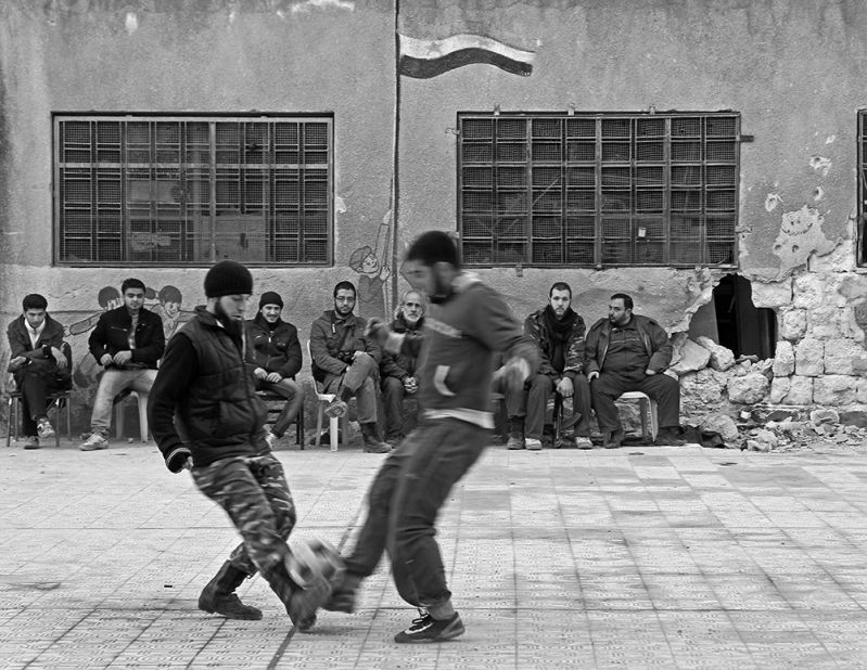 A group of Free Syrian Army fighters in Aleppo, Syria, takes a break for a <a href="http://ireport.cnn.com/docs/DOC-1143212">quick game of pick-up soccer</a>. Photographer Reynaldo Leal captured the game while documenting the conflict in Syria in 2013.