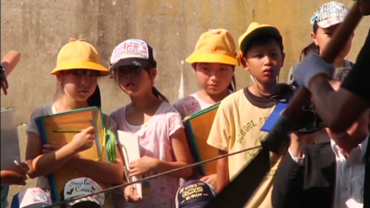 A Japanese coastal town teaches children about whaling, serving up fried whale meat after getting a graphic lesson in how the marine mammals are butchered.