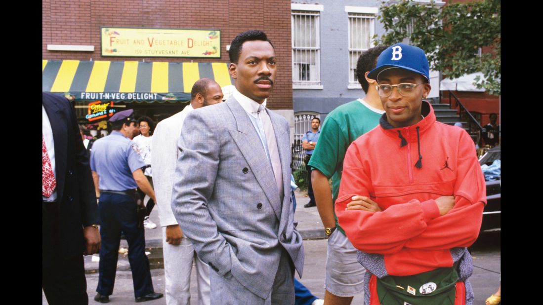 Among the set visitors was Eddie Murphy, left, then at the height of his fame. He and Lee, right, had a sometimes rocky relationship, with Lee criticizing Murphy for not using his clout to help African-Americans in the movie business.