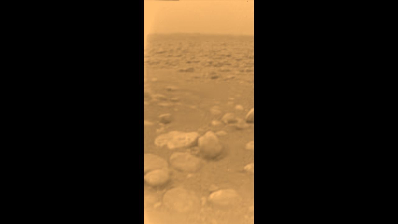 1. The Huygens probe makes first landing on a moon in the outer solar system. The Huygens probe's historic landing in 2005 was the most distant to date.  In addition to providing this photo, the probe found the moon to be similar to Earth before life evolved, with methane rain, erosion, drainage channels and dry lake beds. 