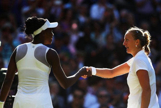 Venus Williams shakes hands with Petra Kvitova after going out in a three-set thriller on Centre Court.