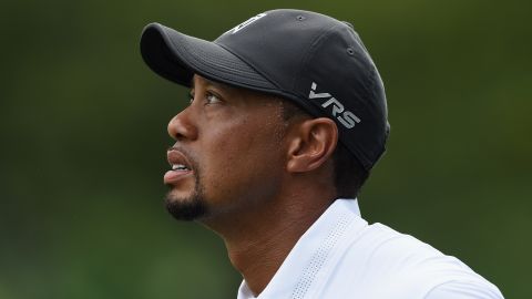 Tiger Woods looks on anxiously after hitting a shot during his second round at the Congressional tournament.