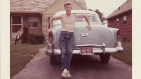 Brian McDaniels, 18, stands in front of his 1954 Chevy Bel Air.