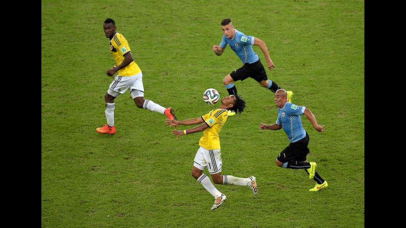 Juan Guillermo Cuadrado of Colombia controls the ball.