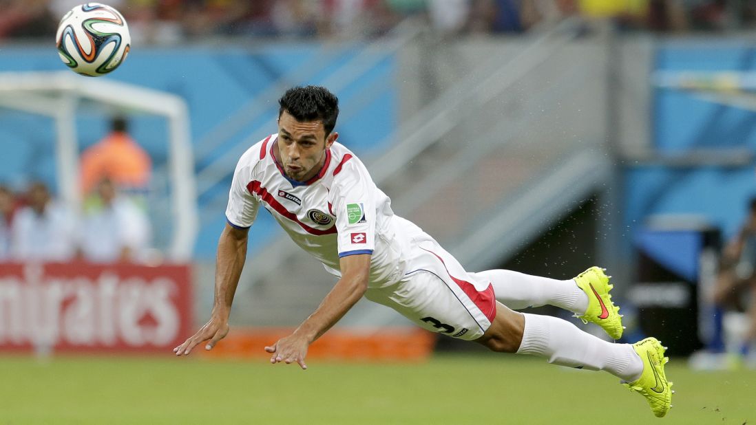 Costa Rica's Giancarlo Gonzalez heads the ball to a teammate.